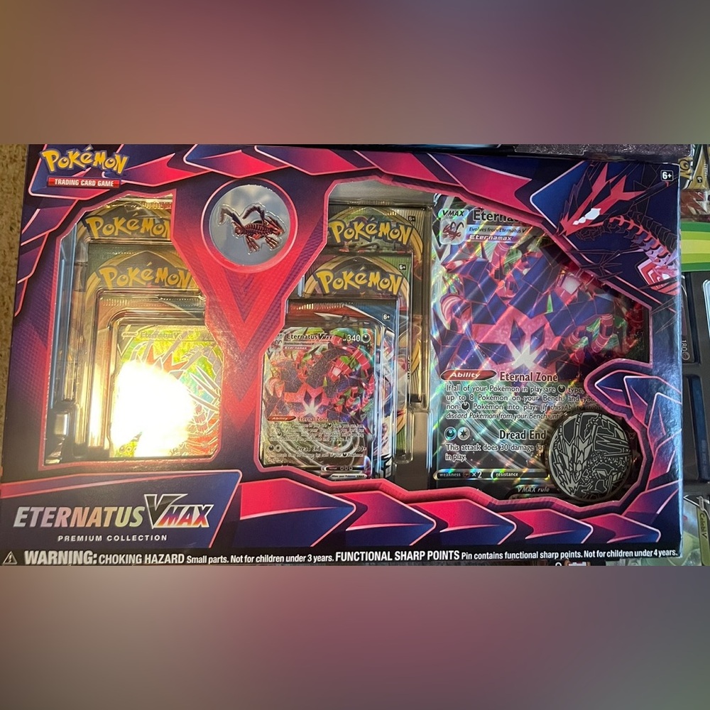Pokemon VMAX Eternatus Collection with Pink and Blue Accents